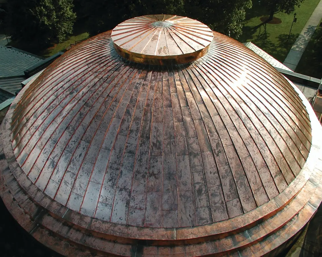 Craftsman Roofing crew installing a new roof in Marcy Holmes